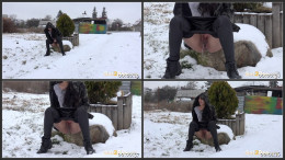 Stunning dark haired girl pisses out in the snow