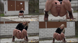 Stunning blonde squats to piss outside
