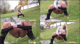 Hot blonde squats and pees over the gras