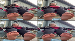 Young Woman Shows Her Feet