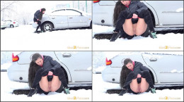 Sexy brunette relieves piss desperation in snow